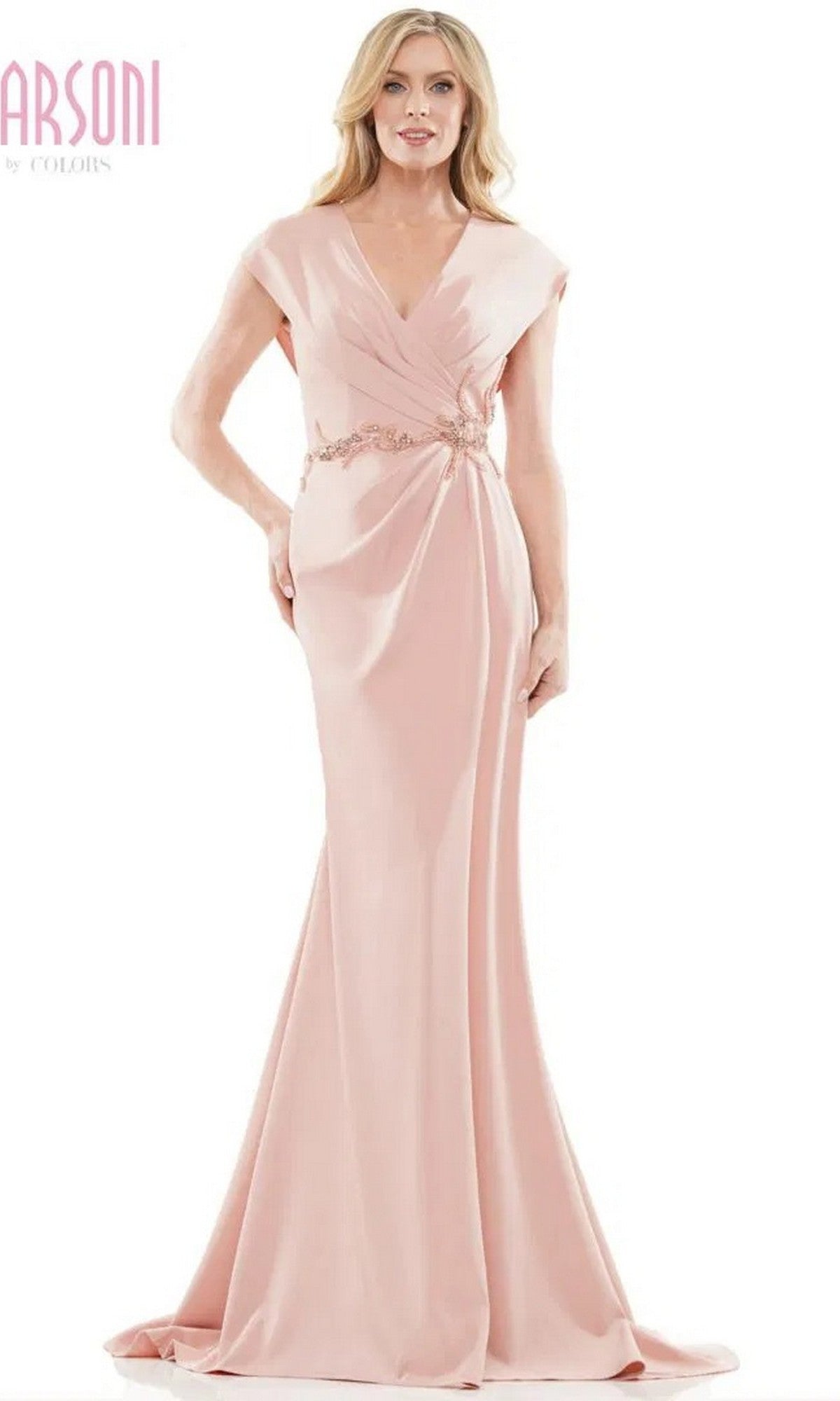 A woman stands against a white background wearing the Marsoni MV1226 long formal dress in mauve, featuring cap sleeves, a V-neckline, and decorative waist detail.
